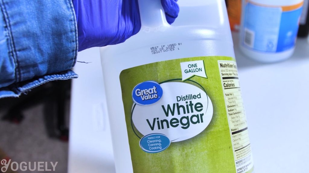 Yoguely - If you need to remove mineral deposits like limescale, use an acidic cleaning agent like vinegar (which has acetic acid). 
